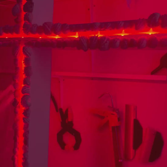 Video of lights changing colors inside a cross.